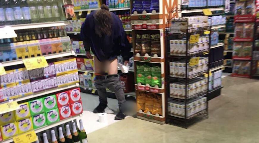 woman poops in supermarket