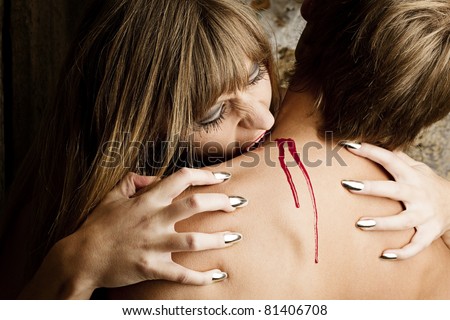 Female Vampire Bites Woman being licked