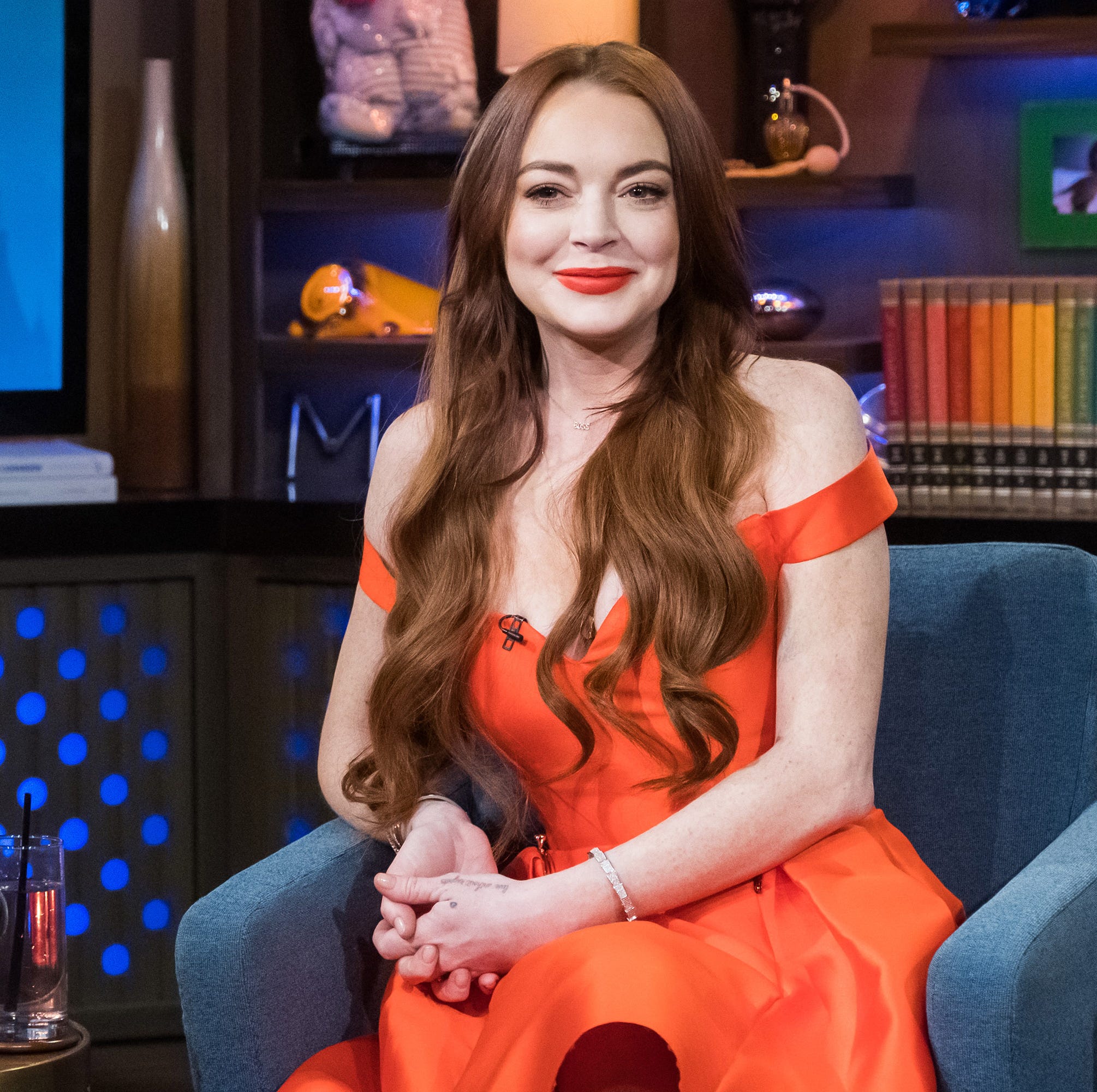 lindsay lohan posts topless photo