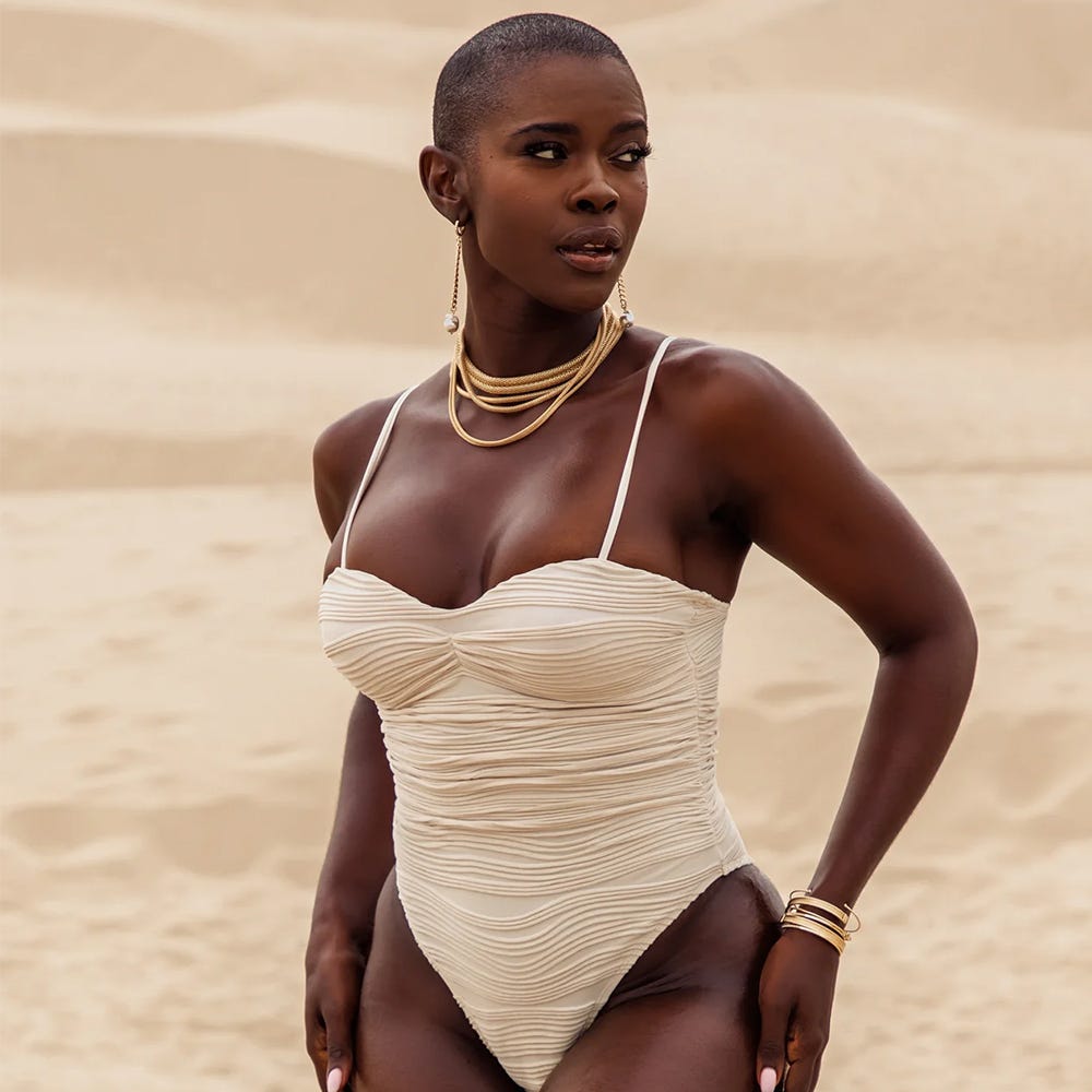 adedamola add black women in bathing suits photo