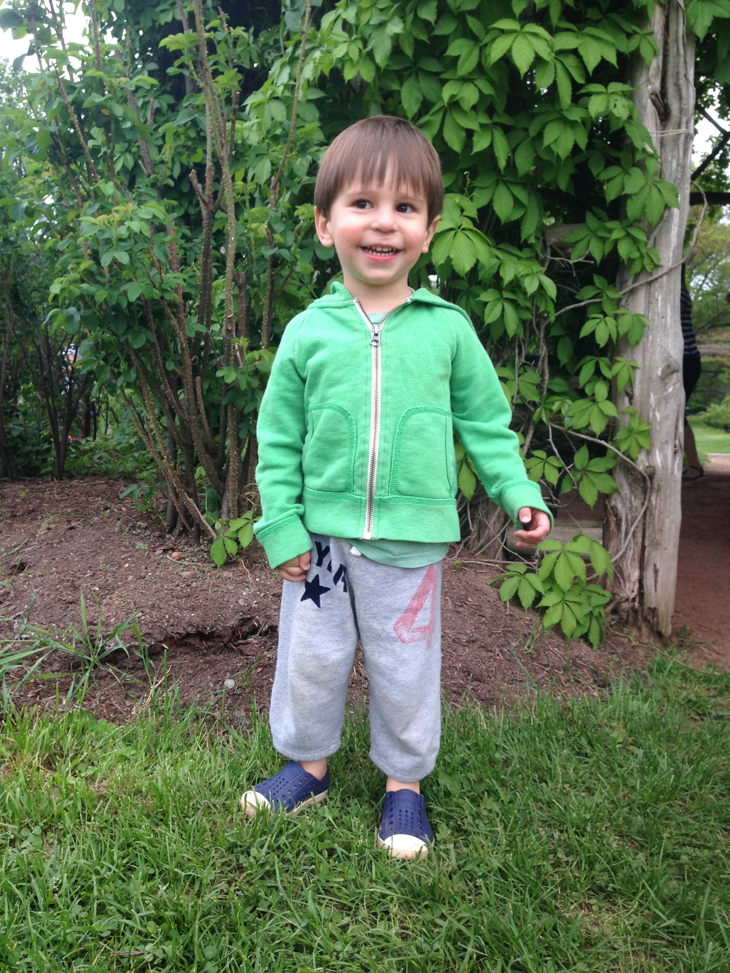 boy peeing on a tree