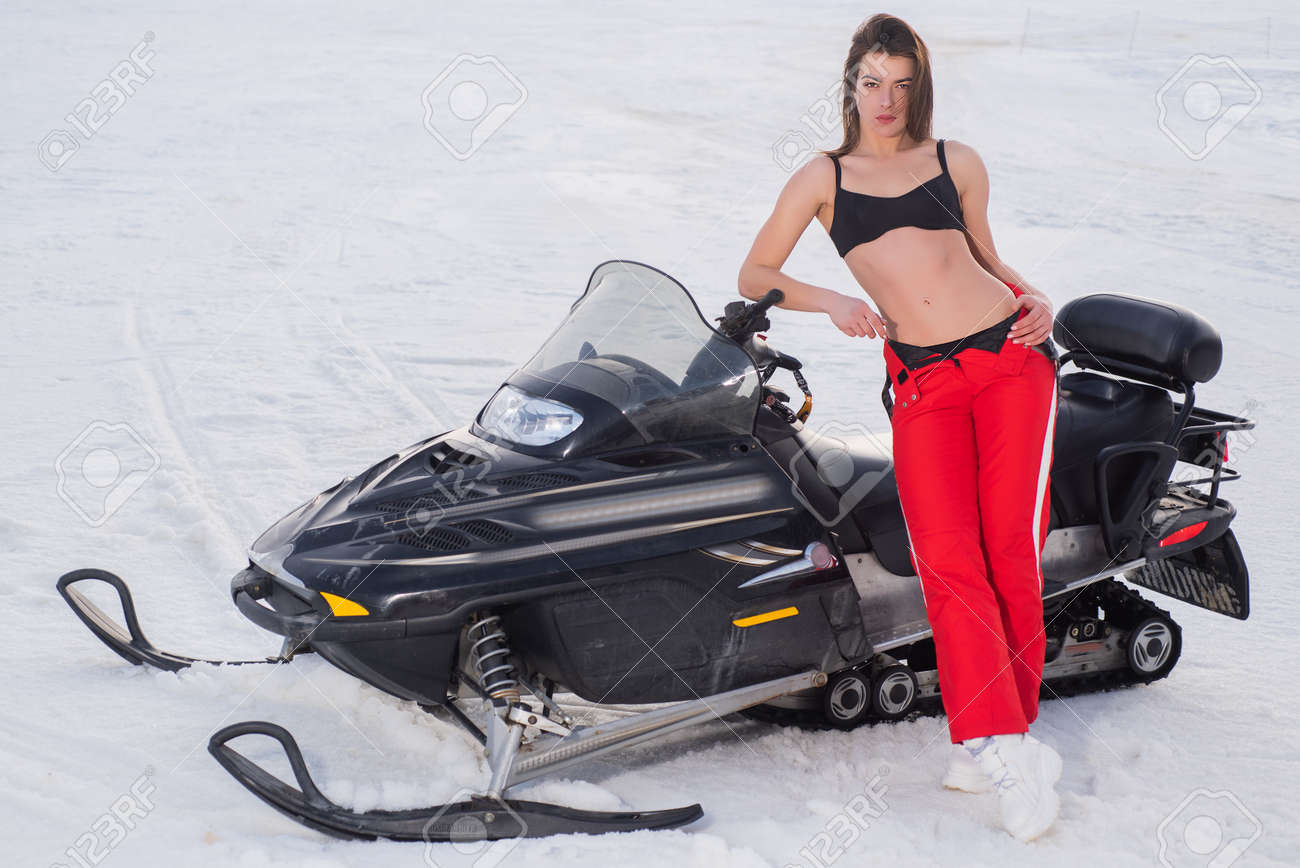 hot girls on snowmobile