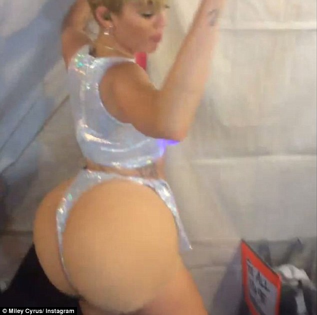 christian mealey add miley cyrus big butt photo