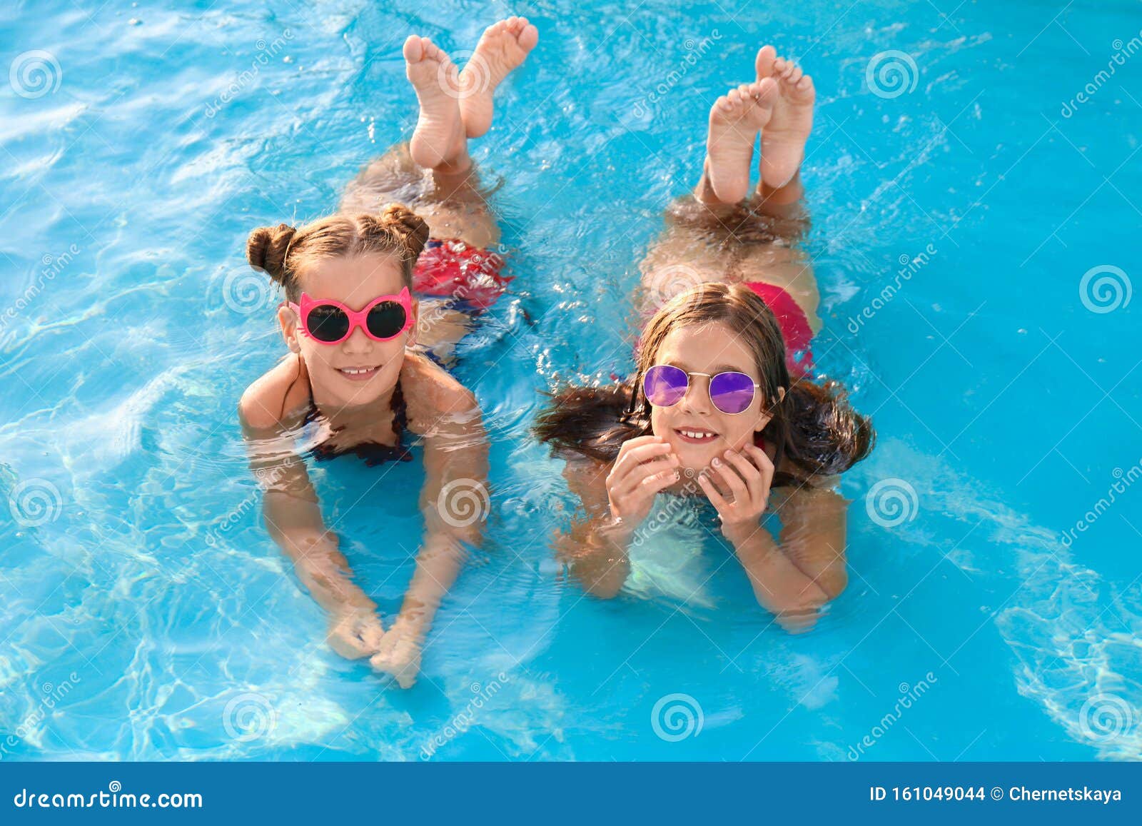 dianne lavender add girls playing in pool photo