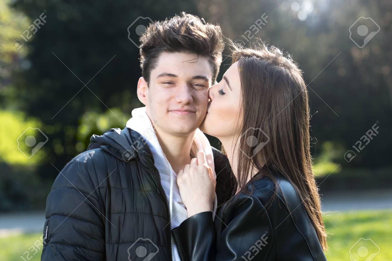 girls kissing a boys