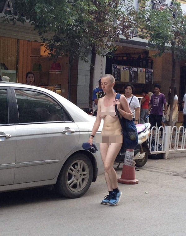 woman walking around naked