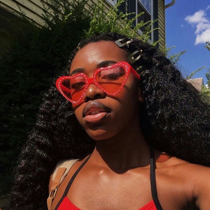 black teen red glasses