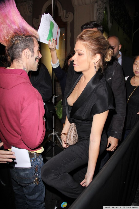 daniel schmunk add leann rimes nipple slip photo