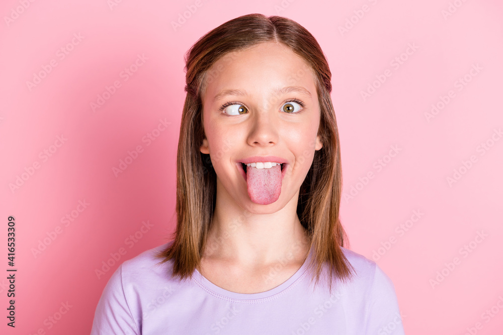 teen girl sticking out tongue