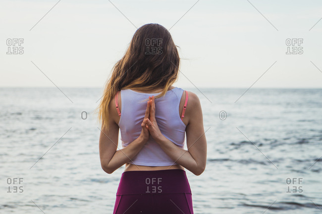 woman hands behind back