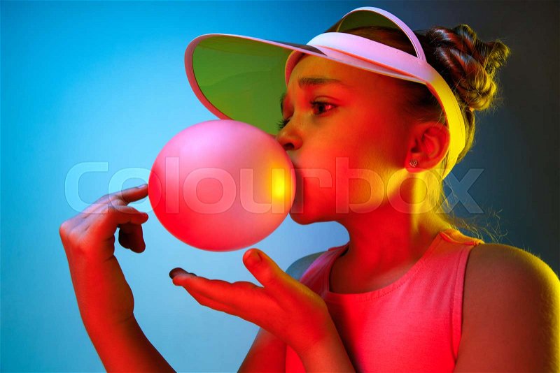 apel hijau add woman blowing bubble gum photo