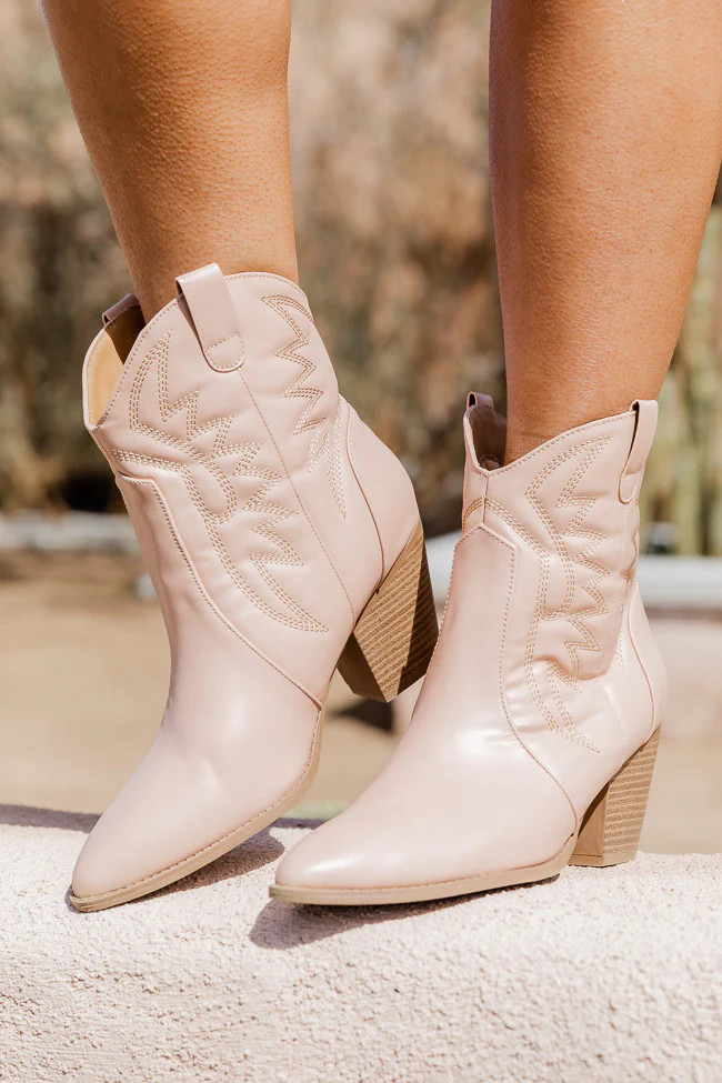 nude in cowboy boots