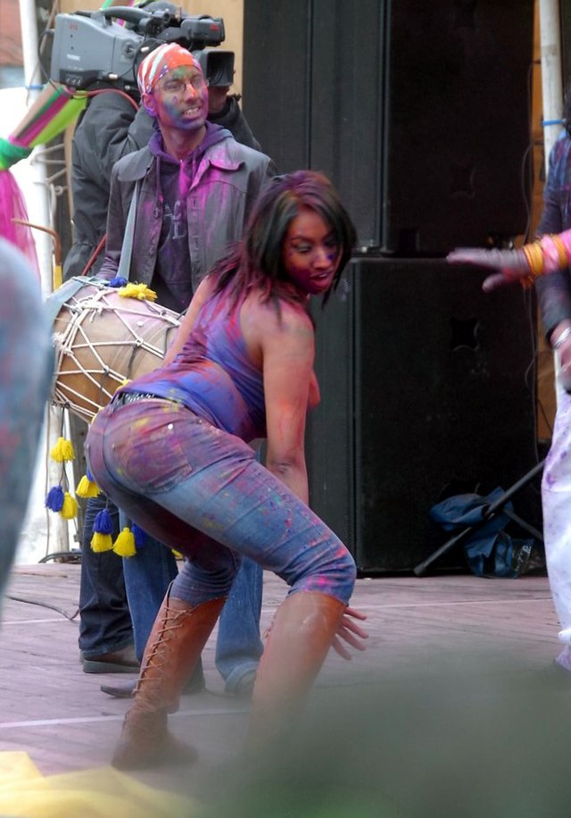 women bending over in public