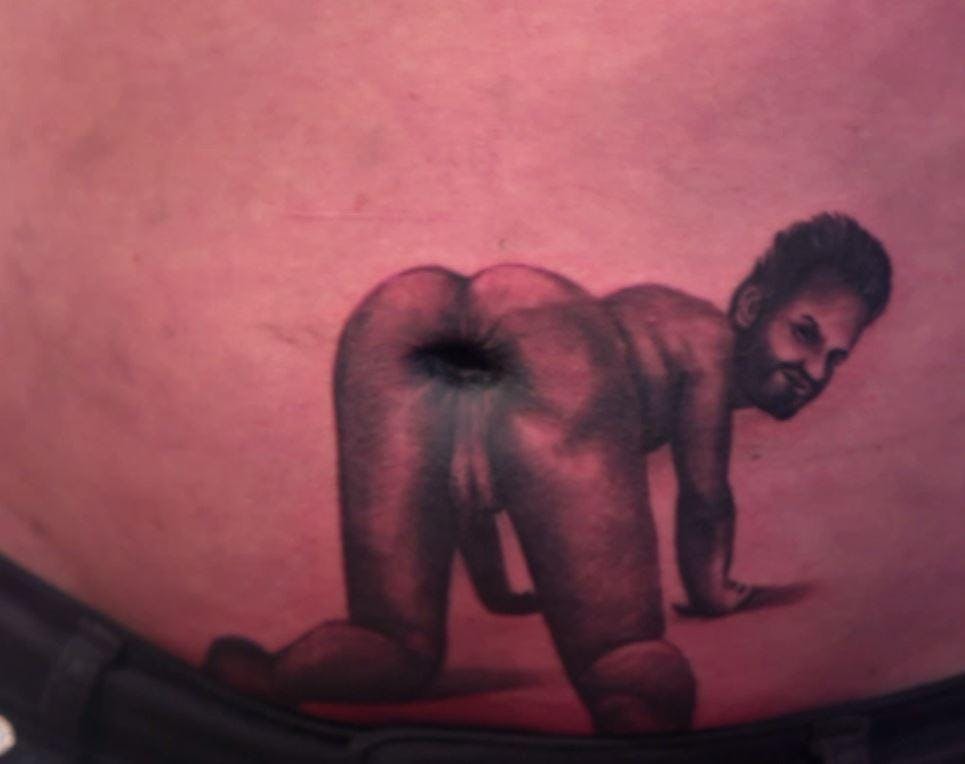 female butt hole tattoo