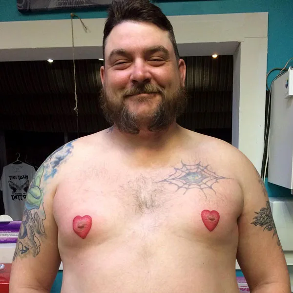 brandon peek add photo heart shaped nipples tattoo