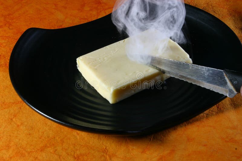 coco shrerll add hot knife through butter gif photo