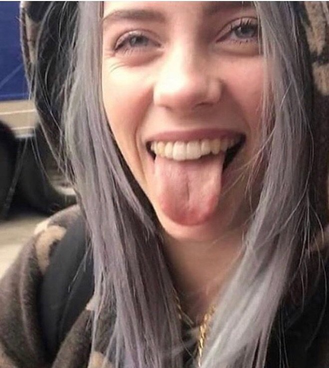 andrea simoni share billie eilish tongue out photos