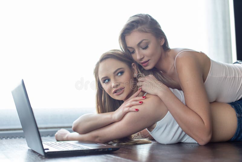 lesbians rub each other