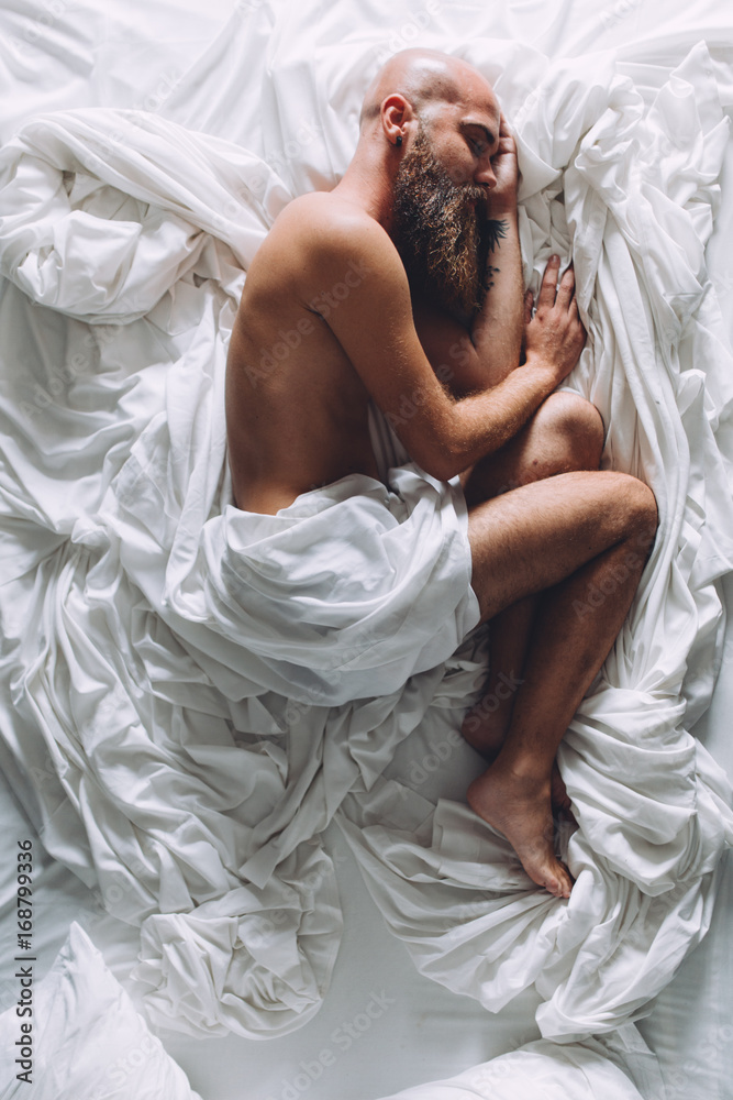 men sleeping together naked