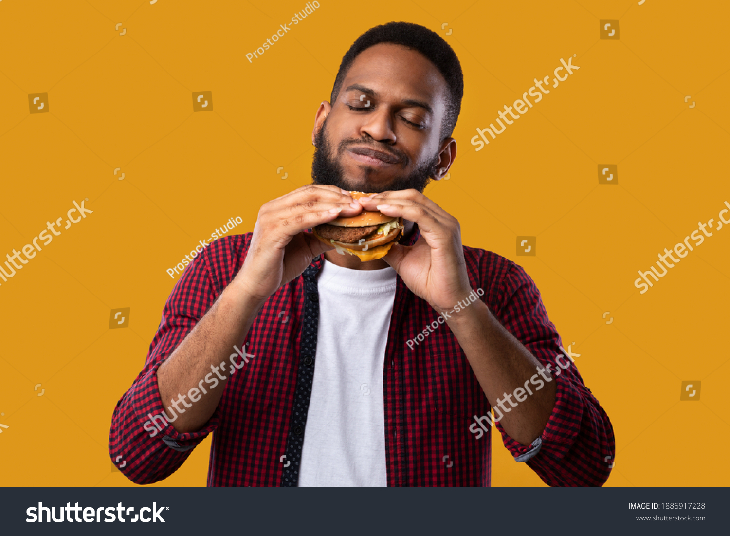 adam larosa recommends black guy eating hamburger pic