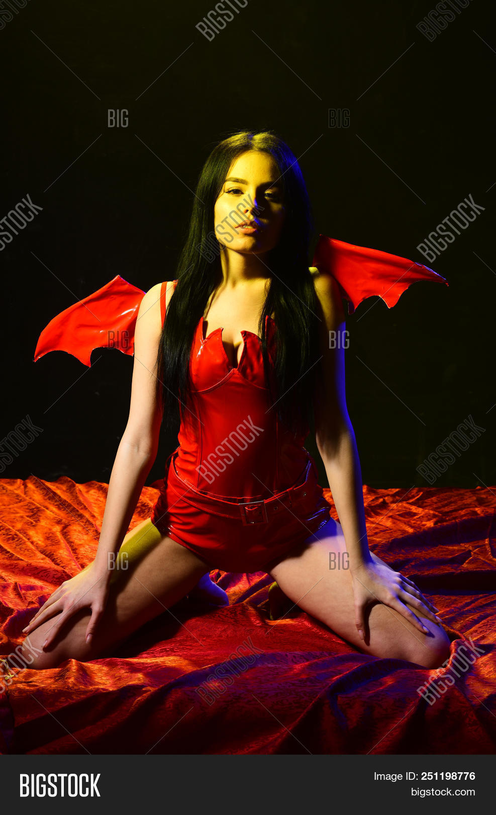 charles lawrie add sexy demon girl photo
