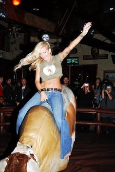 girl on mechanical bull