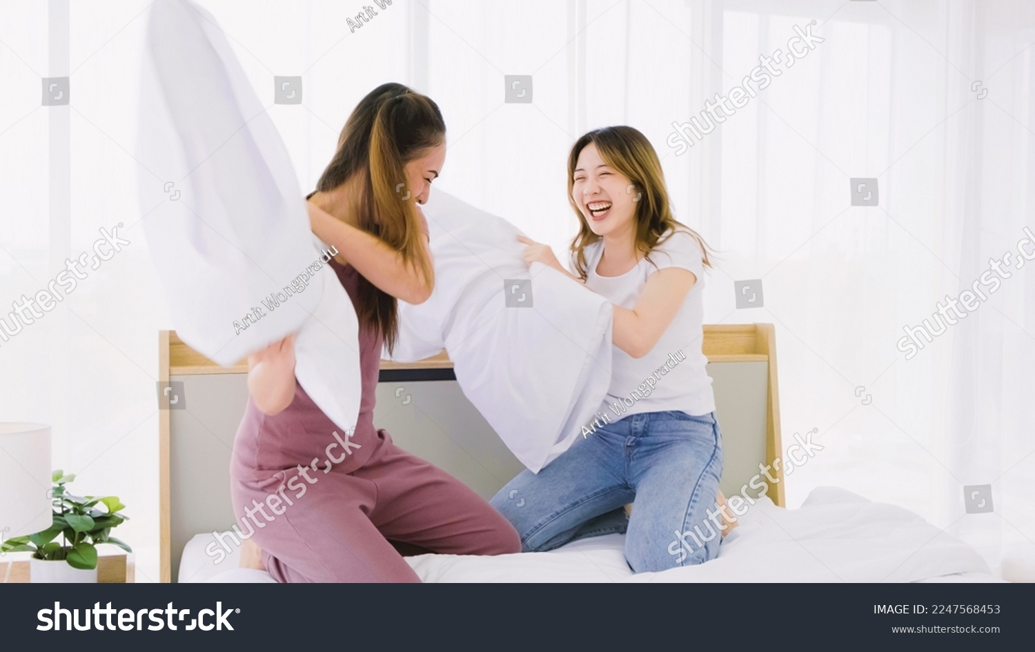 girls having pillow fights