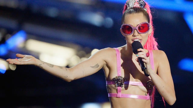 deloris gibson recommends miley cyrus topless concert pic