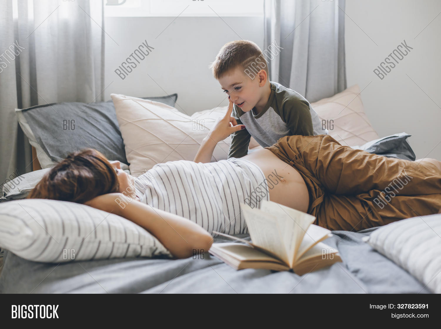 mom and son share same bed