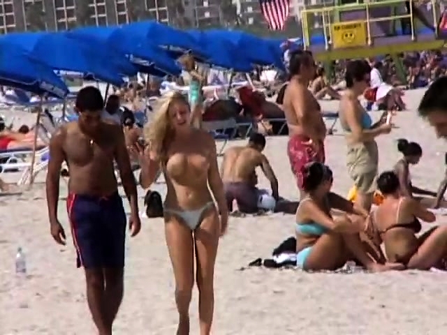 Porn On Public Beach topless scene