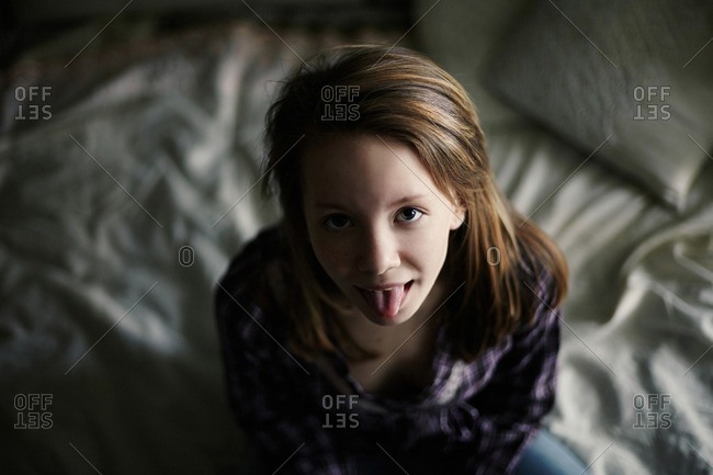 Best of Teen girl sticking out tongue