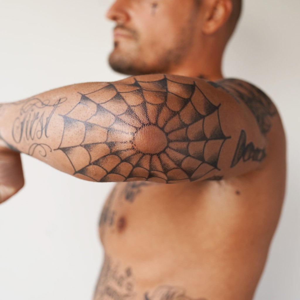 chris minall recommends web on elbow tattoo pic