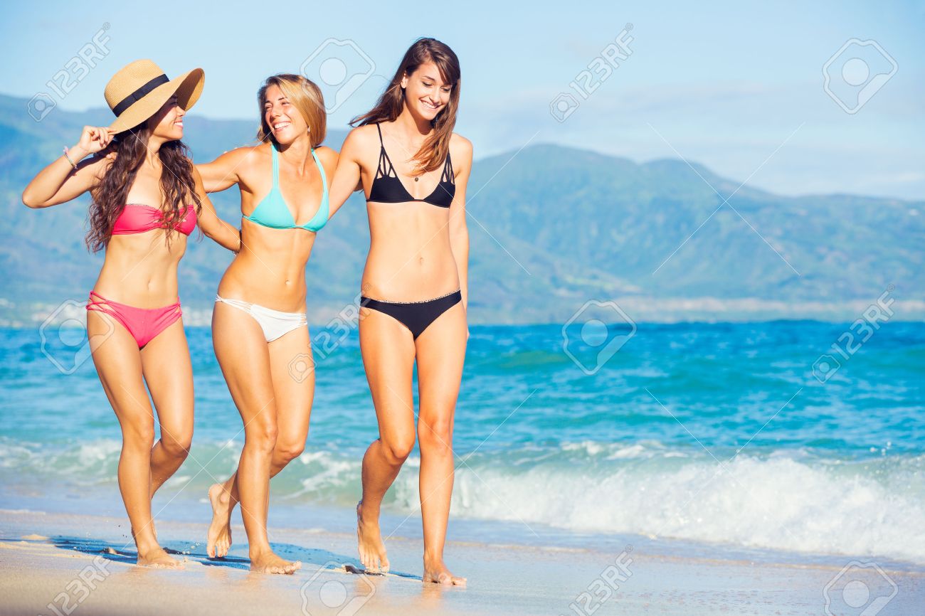 bruce langille add women walking on beach photo